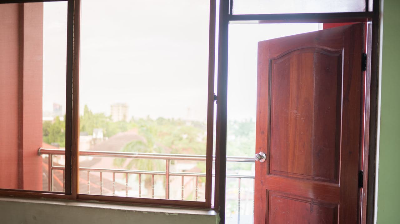Open door and window view from a guest room at Mountain G Hotel